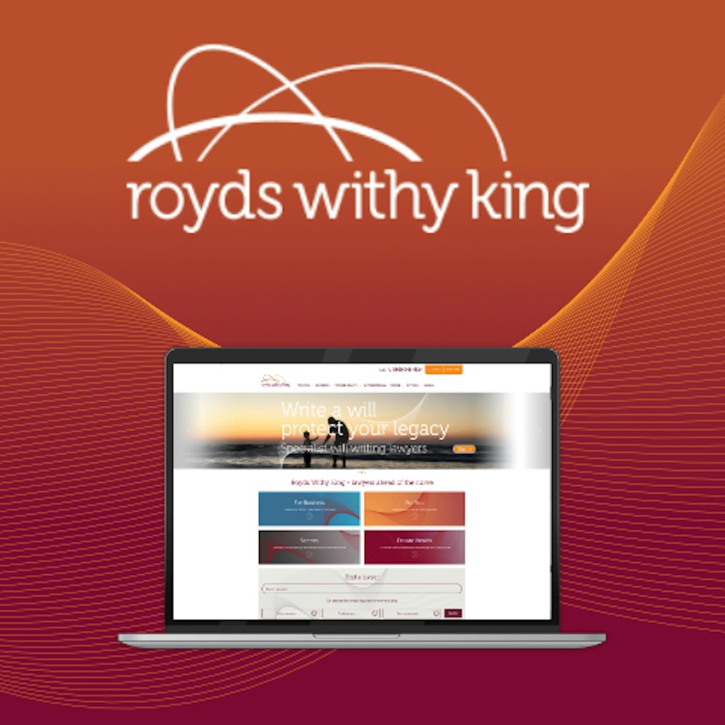 A laptop with Royds Withy King' homepage with the Royds withy king title above it.